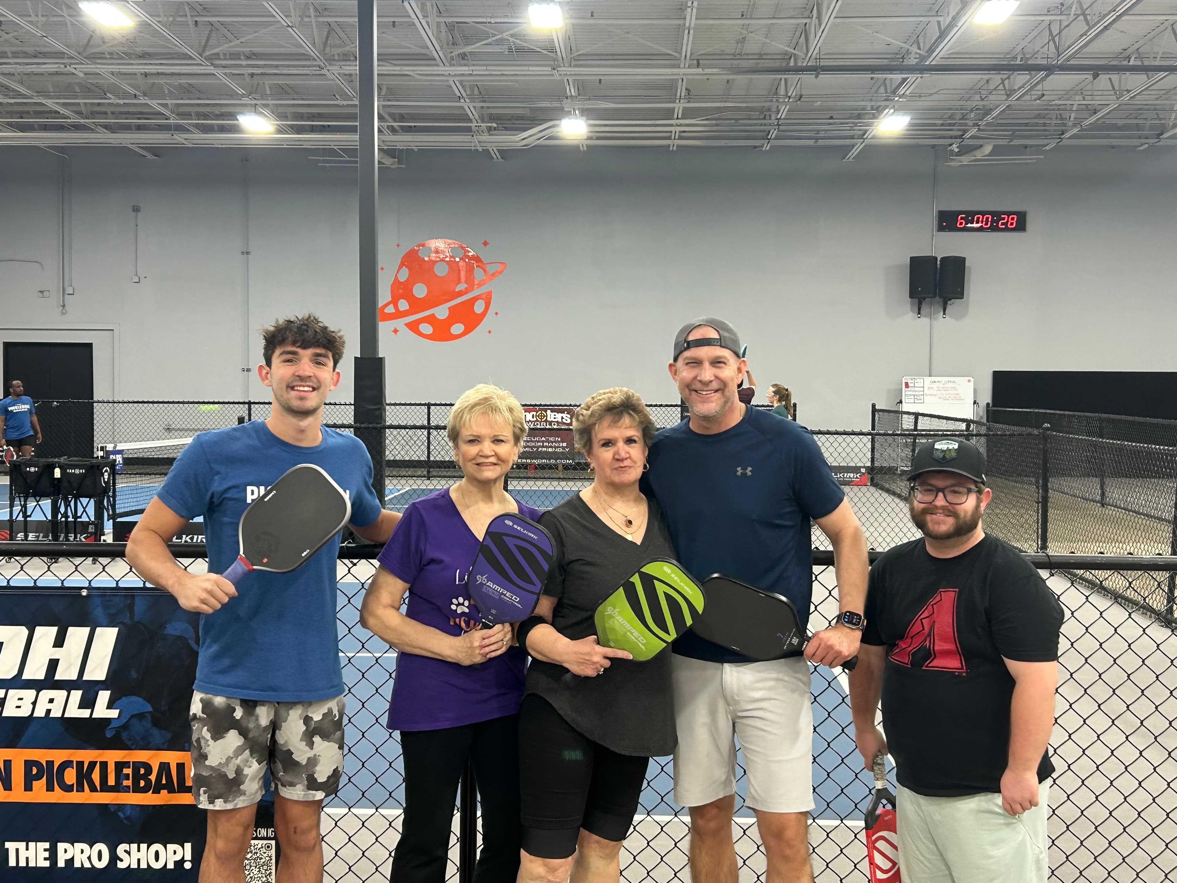 Jackson coaching a pickleball lesson